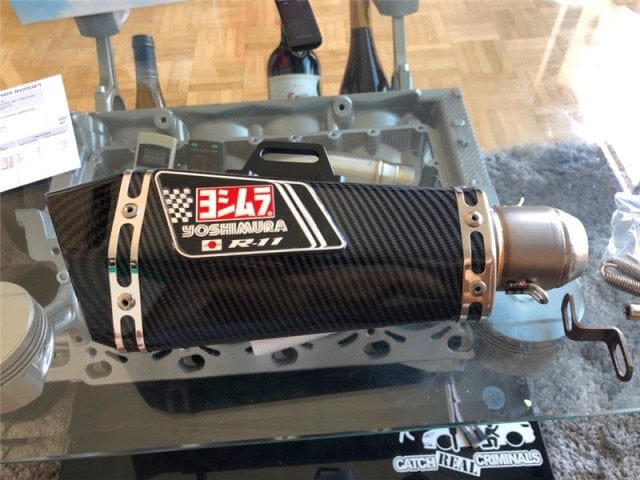 Motorcycle exhaust with Db killer stickers